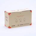Back of a cream Ippodo gyokuro tea bag box with brewing instructions, barcode, and orange corner accents on a plain white background. - thumbnail 3