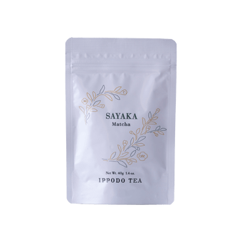 White resealable 40 gram bag of Ippodo Sayaka matcha with gold and green floral design and text