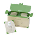 Open box filled with Ippodo sencha tea bag packets with green accents, alongside a single sencha packet in front. - thumbnail 1