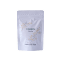 White resealable 40 gram bag of Ippodo Ummon matcha with gold and green floral design and text
