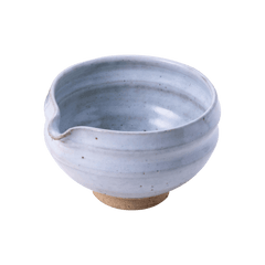 Artisan-made ceramic speckled white matcha tea bowl with hand groove and serving spout made from Mino-yaki Japanese clay