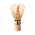 100-tip bamboo chasen matcha whisk tea utensil with curles tips resting upright on handle