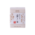 New unopened beige box of Ippodo Tea Co. Wakaki matcha with Japanese characters and gold leaf flowers embossed on white