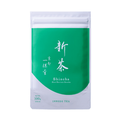 Flat bright green and white packaging bag for Uji-Shincha with white Japanese and English writing 