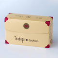 Sealed long beige box of 25 Gyokuro Teabags with pink corners, easy open tab and Ippodo Tea logo on bronze circle