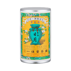 Iconic colorful Ippodo Tea metal can with yellow turquoise pink label of teapot and flowers for Nichigetsu sencha green tea