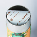 Iconic colorful Ippodo Tea metal can of Japanese sencha green tea with top open revealing branded foil bag inside