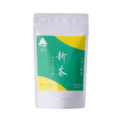 Package for Uji-Shincha sencha one-pot teabags with vibrant green label with yellow circles and Japanese and English writing