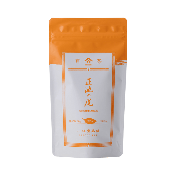 White packaging with orange faux-painted details for Shoike classic Japanese Sencha green tea 80g bag by Ippodo Tea Co.
