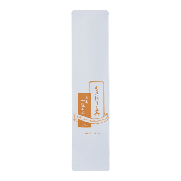 White and orange iconic packaging for Ippodo Tea Co. Stems Hojicha roasted green tea with Japanese writing and dashed lines 