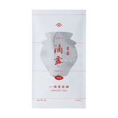 White packaging bag for Tekiro Gyokuro by Ippodo Tea with grey pointillism teapot and red writing and designs