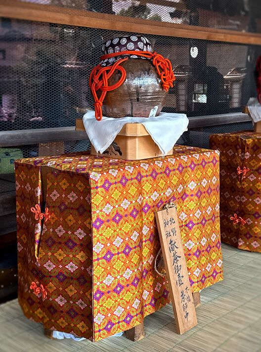 The jars are placed outside the inner shrine, before the ceremony