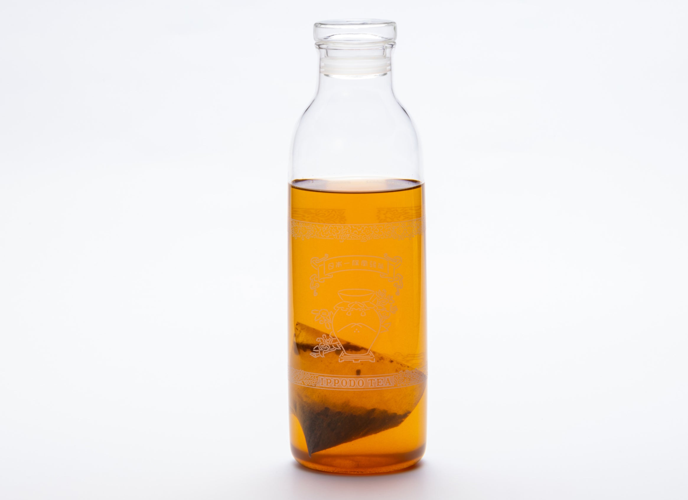 Mugicha Barley Teabag in a glass carafe steeping in cold water. - Mugicha Teabags - Cold Brew