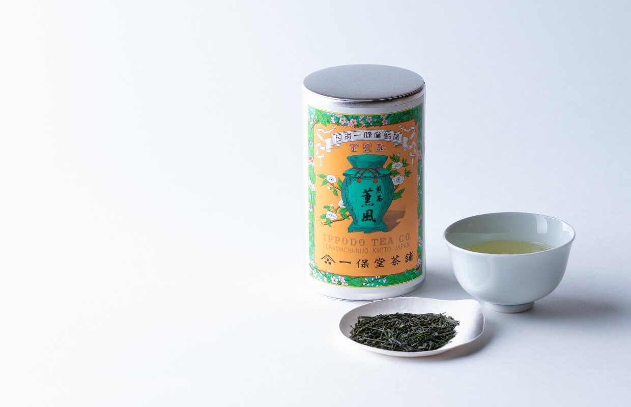 vibrant green matcha in a bowl, served with cholocate brownies